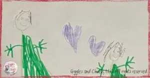A drawing of a young child and her mom