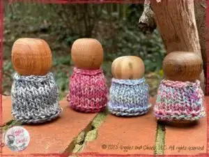 Four small wooden characters, turned on a lathe