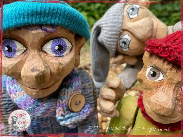 Three wooden puppets