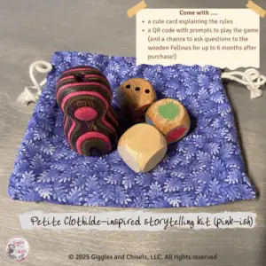A story telling kit with a lathe-turned creature, and 3 dices
