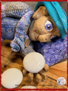 A wooden puppet inventing stories with doorknob