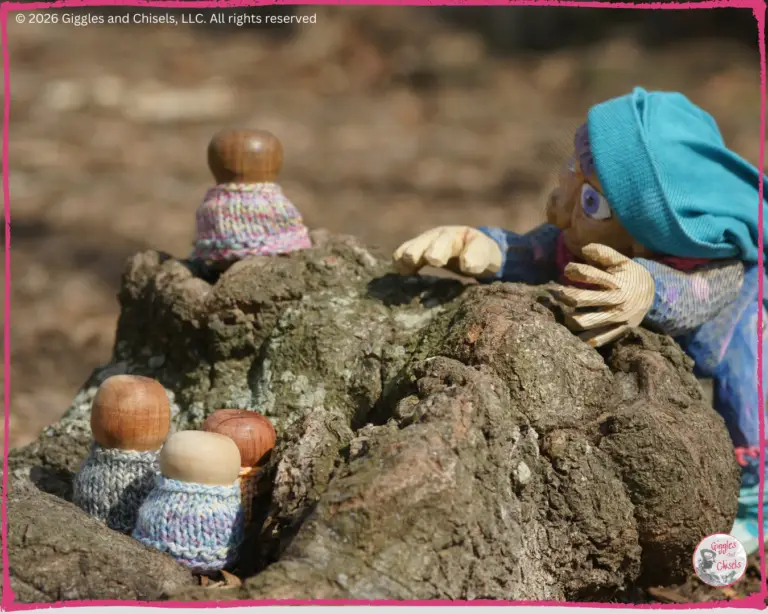 Petite Clothilde, a wooden puppet, with some whimsical charaters, called the Bouilles