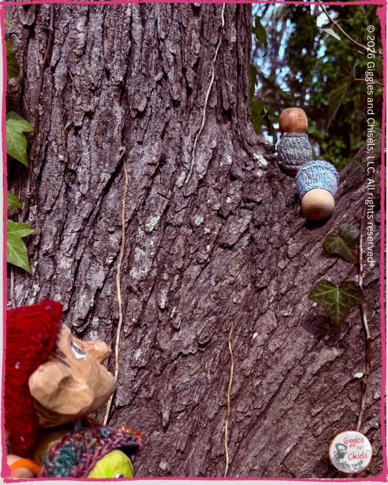 Pierre Qui Roule, a wooden puppet, looking at whimsical creatures on a tree