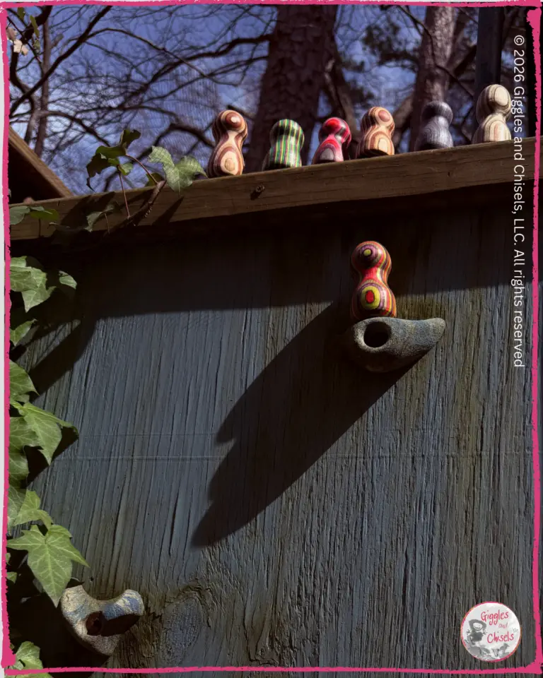 Some Pouilles, whimsical creatures, climbing on a climbing wall