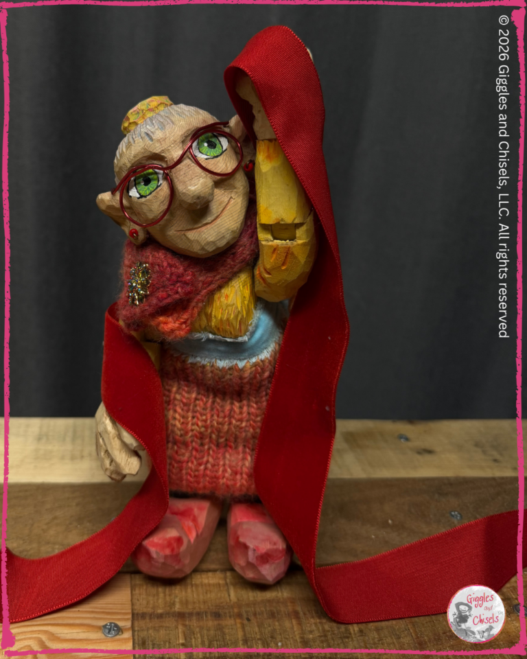 Mme Rigolotte, a wooden puppet, dancing with a ribbon