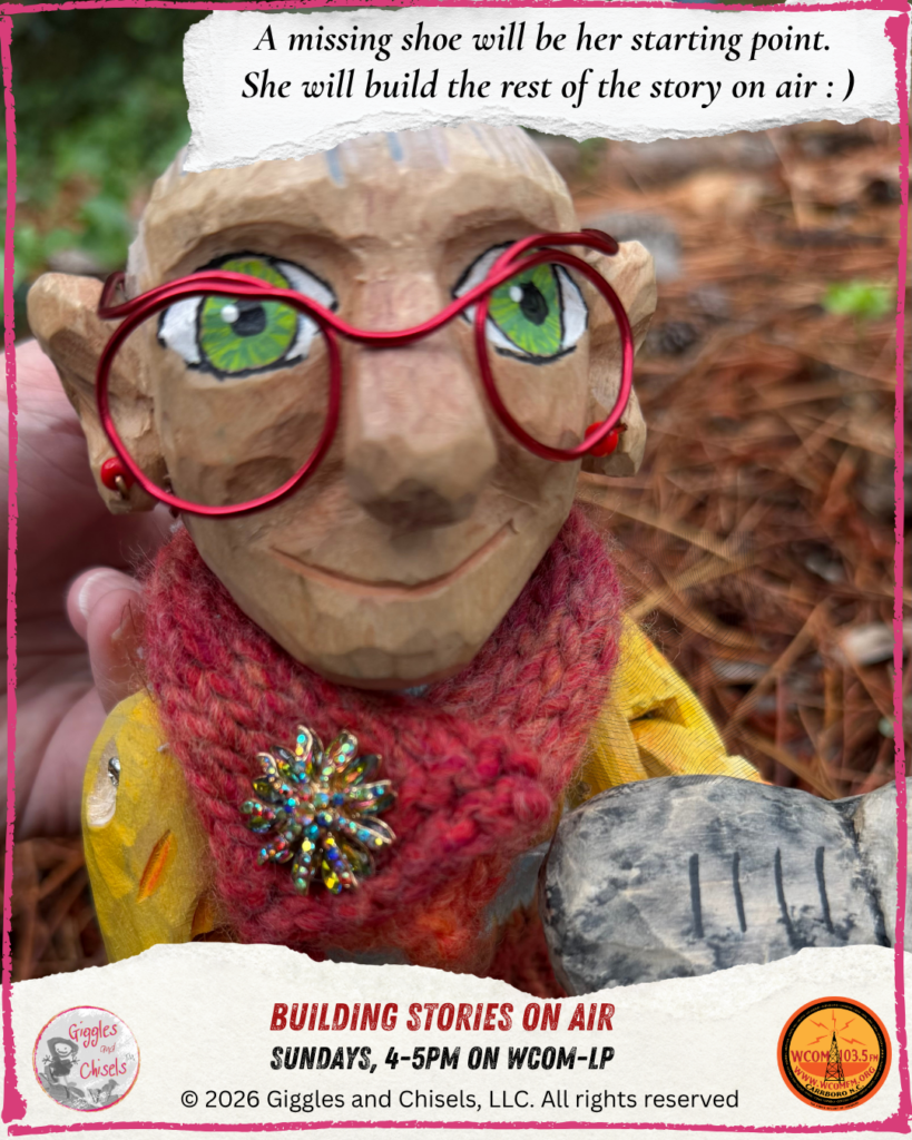 Mme Rigolotte, a wooden puppet, holding a shoe