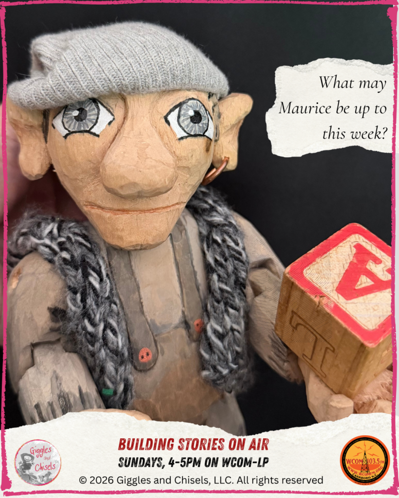 A picture of Maurice, a wooden Fellows, holding some cubes