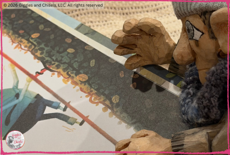A wooden puppet, looking at a picturebook