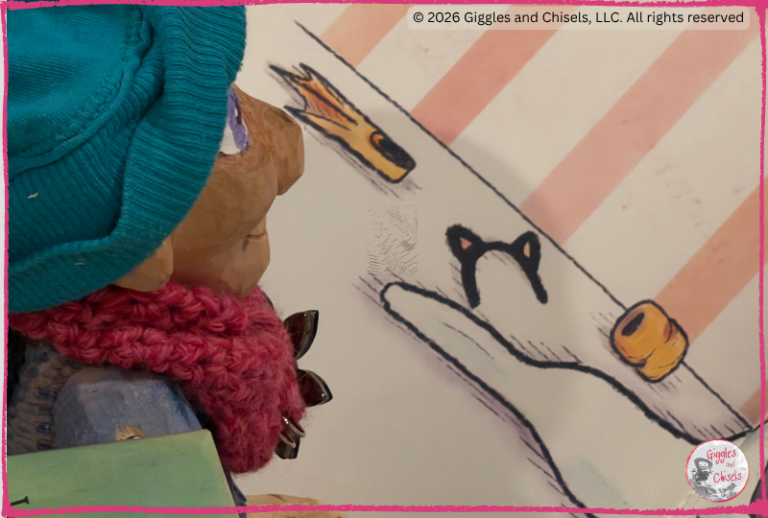 A wooden puppet, looking at a picturebook