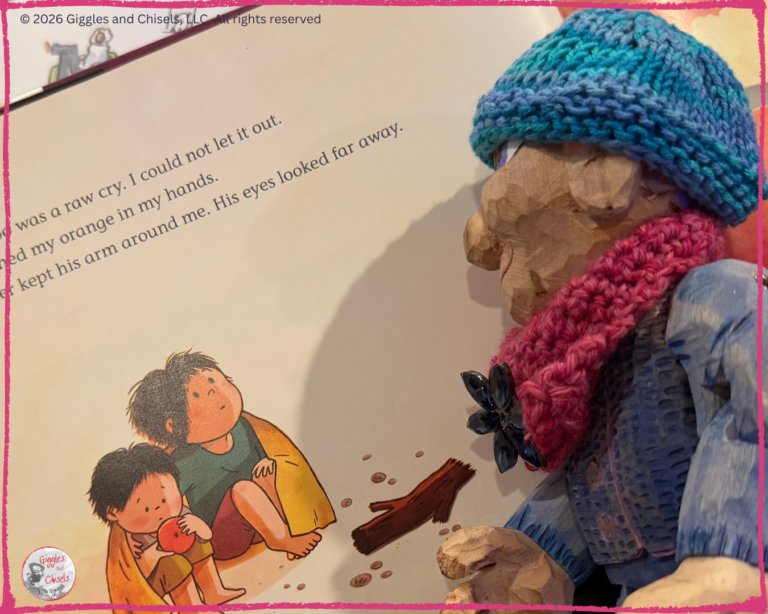 A wooden puppet, looking at a picturebook