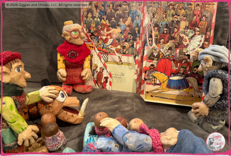 The wooden fellows looking at a pop up book